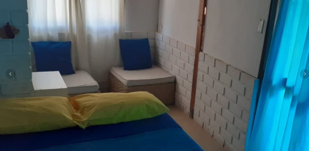Family Quadruple Room, 2 Queen Beds, Pool View photo 1