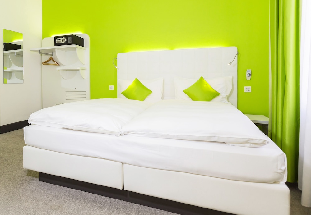 Budget Room with Queen Bed, only accessible by the stairs