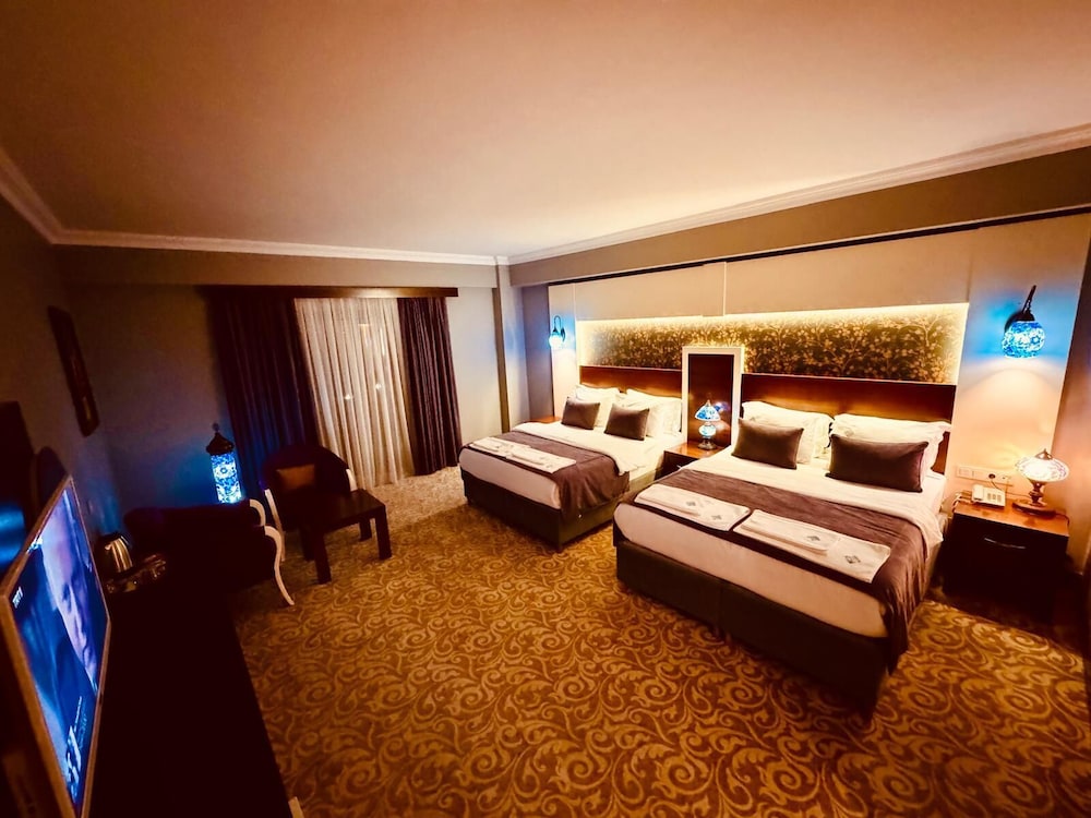Deluxe Quadruple Room, 1 Bedroom, Non Smoking photo 1