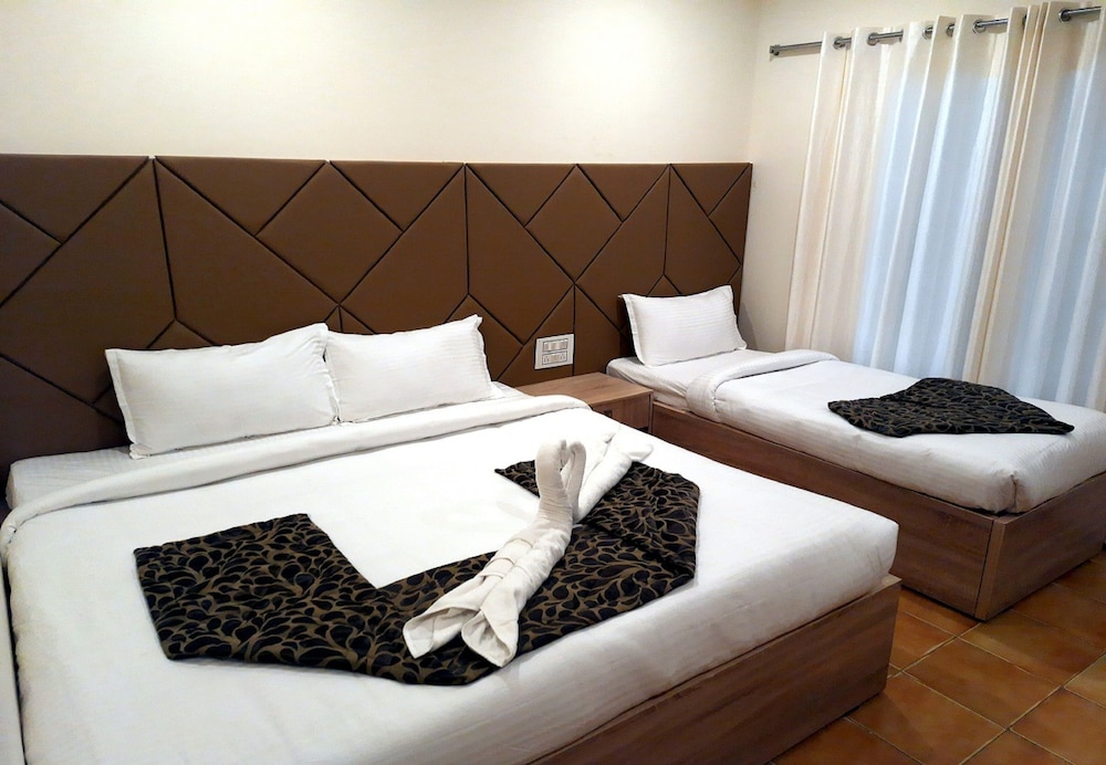 Deluxe Triple Room - Photo 7