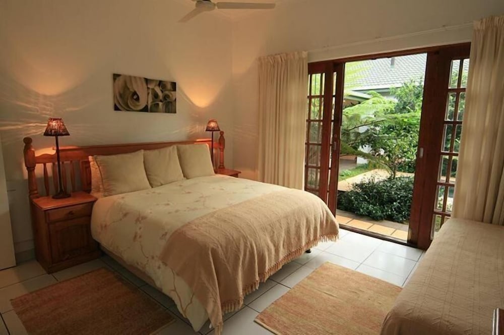 Family Room, 1 Bedroom (Double Bed + Single Bed/Bath + Shower) photo 1