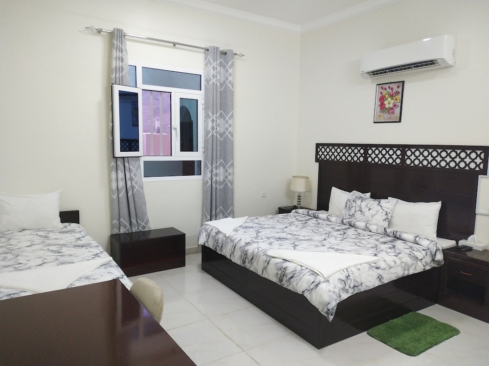 Standard Quadruple Room, Multiple Beds, Non Smoking, Courtyard View photo 2