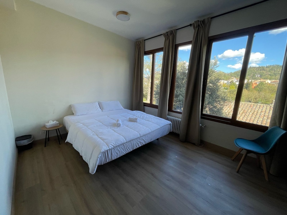 Habitación Confort Doble o Twin, 1 Cama Queen, Baño Compartido, Vista al Jardín