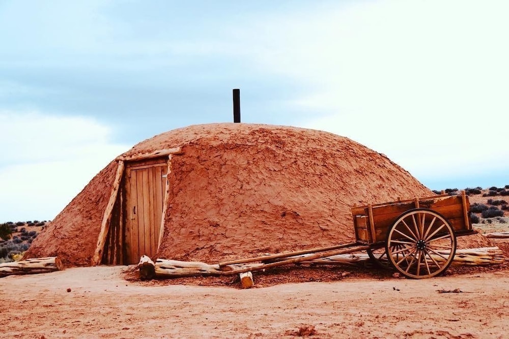 Traditional Earth and Log Navajo Hogan