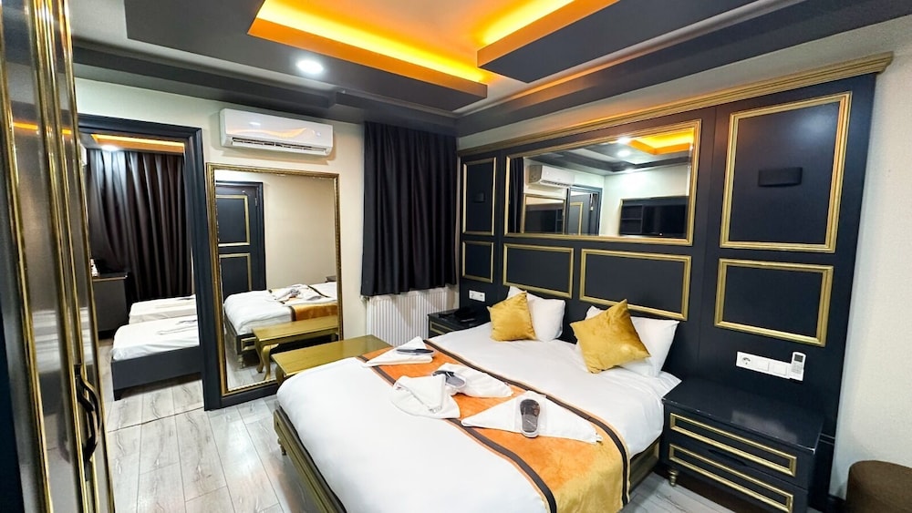 Comfort Quadruple Room, Multiple Beds, Smoking photo 1