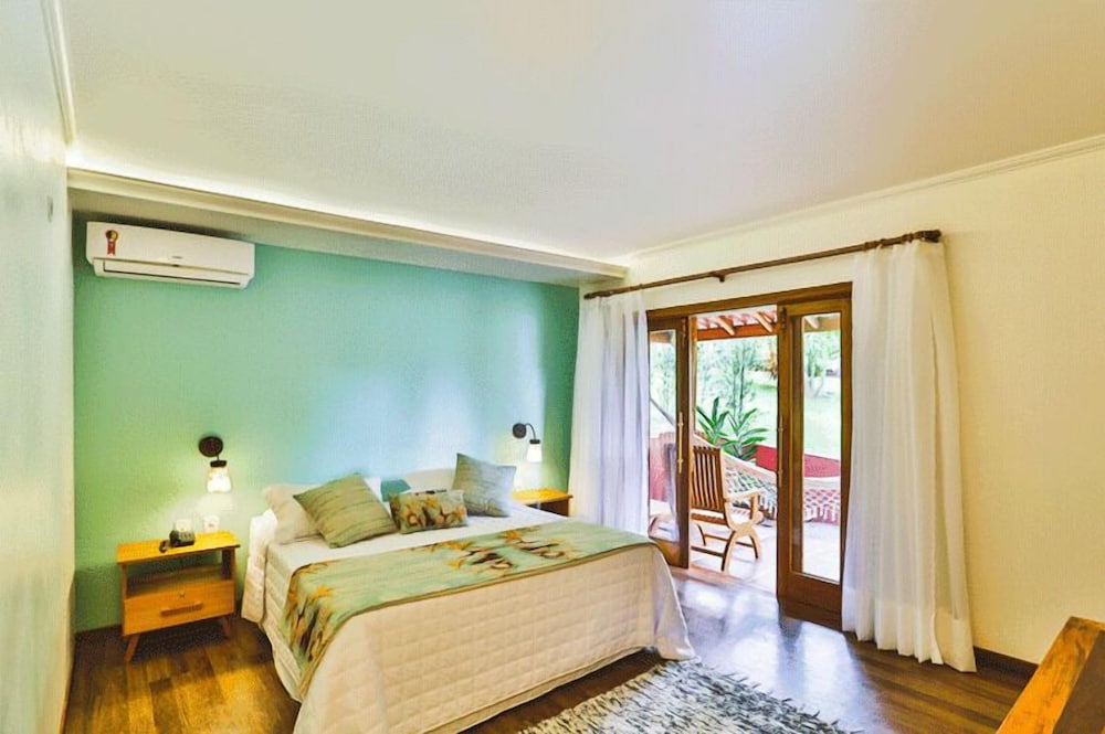 Quarto casal premium, 1 quarto, sacada, vista para o jardim Piso Térreo