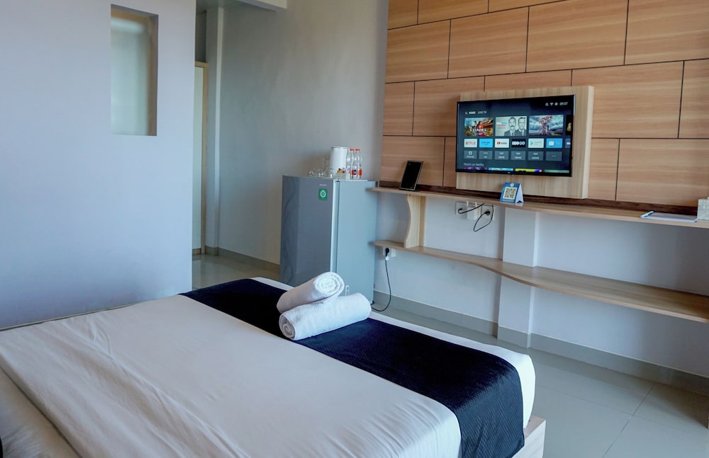 Deluxe Room - Photo 1