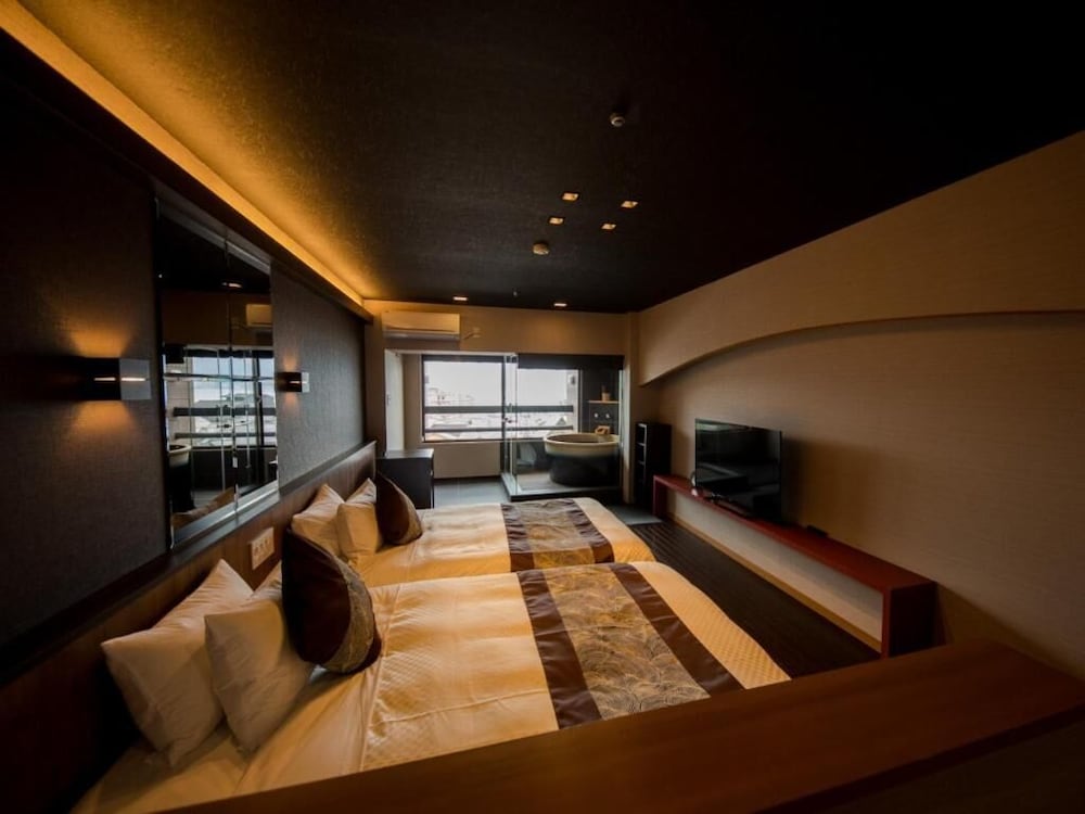 Western-style modern Japanese room with open-air bath and ocean view Smoking photo 2