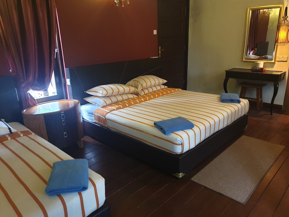 Deluxe Triple Room, Garden View photo 2