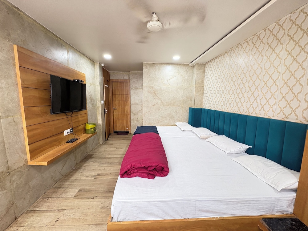 Deluxe Quadruple Room, City View photo 3