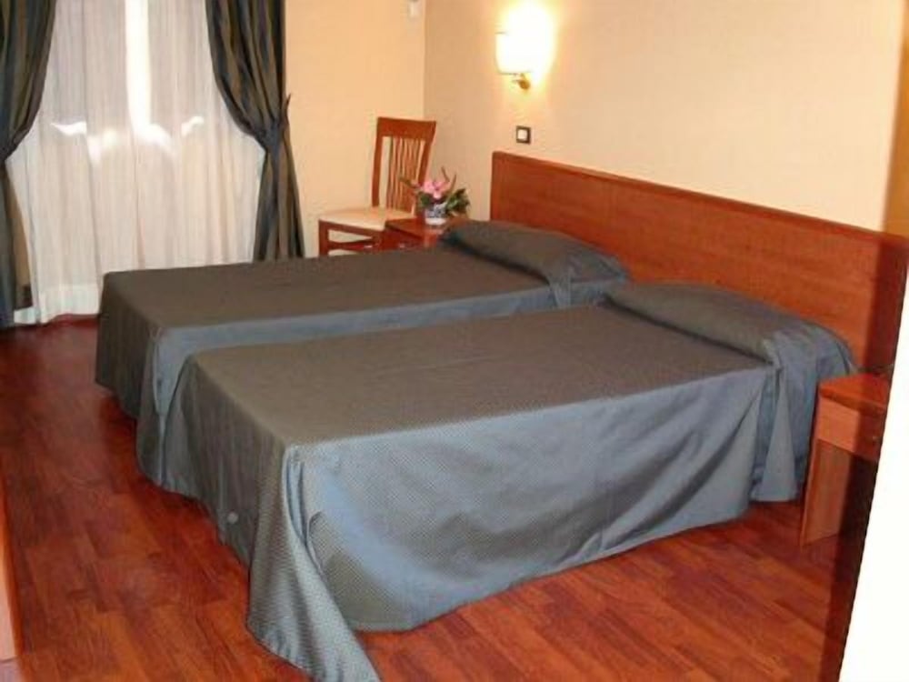 Doppel- oder Zweibettzimmer