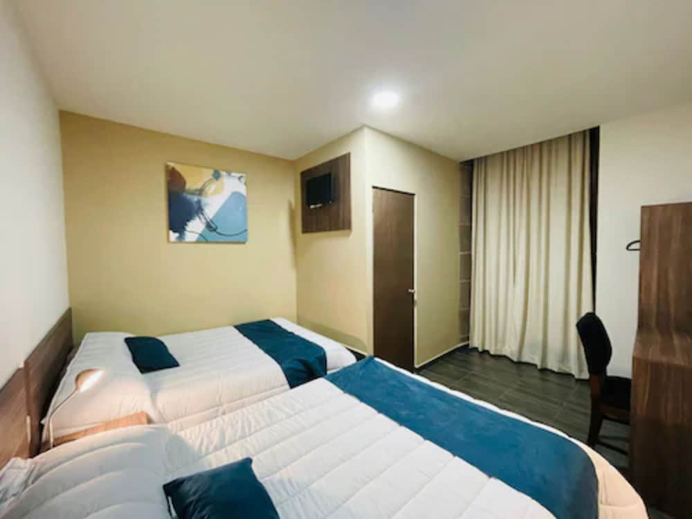Superior Quadruple Room, 2 Double Beds, City View photo 1