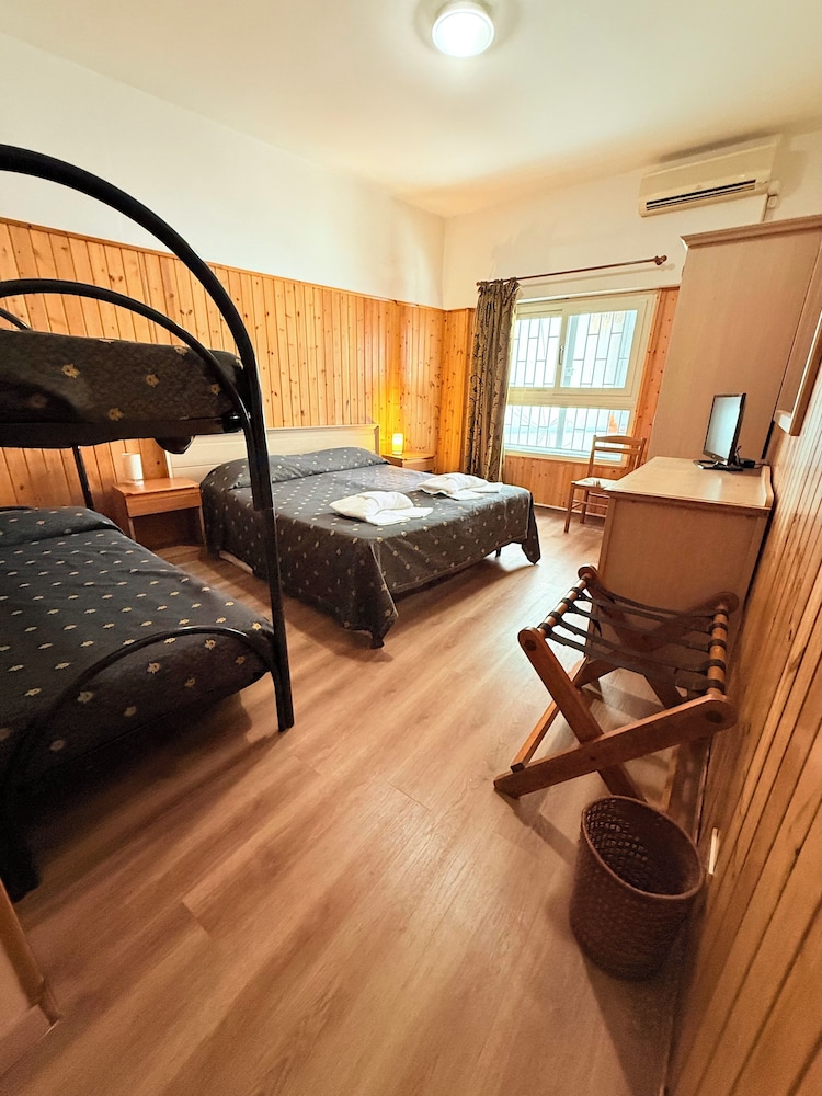 Economy Quadruple Room, Courtyard View