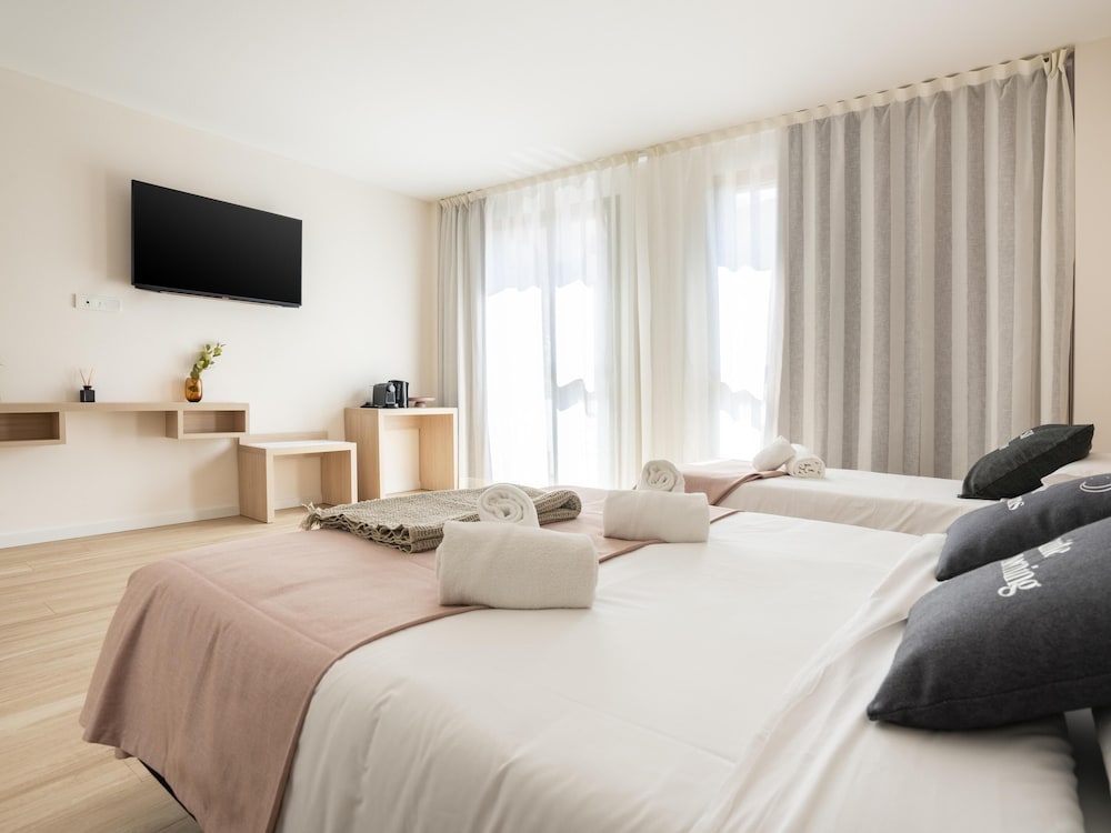 Habitación Triple con Balcón