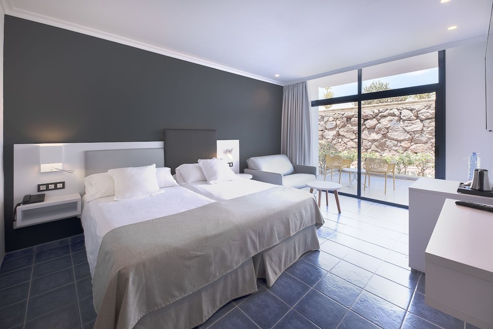 Habitación Doble o con Dos Camas (2 adultos y 1 niño)