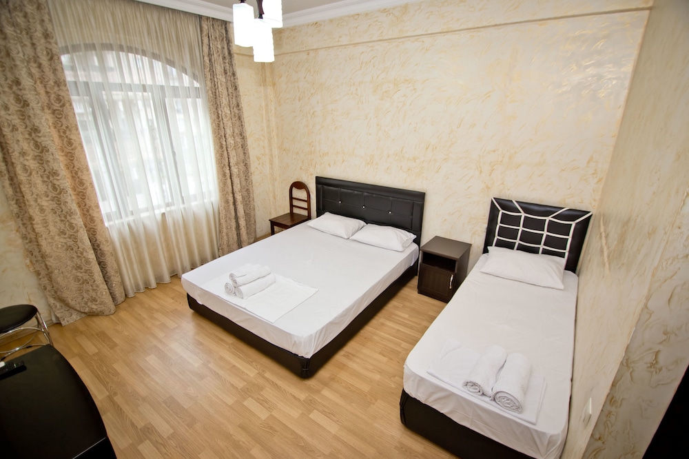 Triple Room, Multiple Beds, Balcony (302)