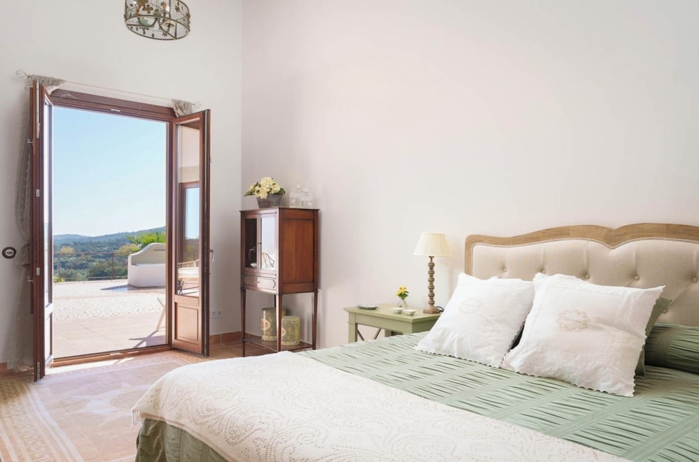 Habitación Cuádruple Deluxe, Vista al Jardín
