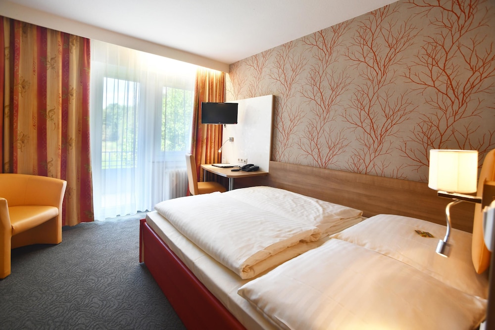 Comfort Single Room with extendable 90-140 cm bed on room wall photo 2
