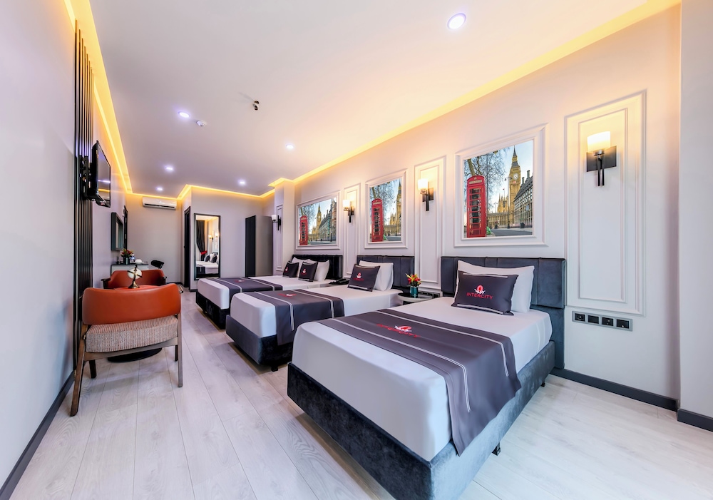 Deluxe Quadruple Room - Photo 9