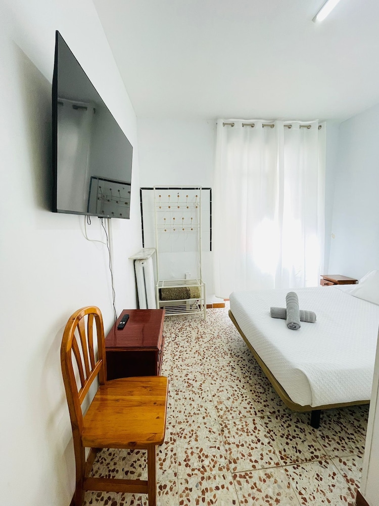 Habitación Doble Premium, Baño Privado, Vista al Patio