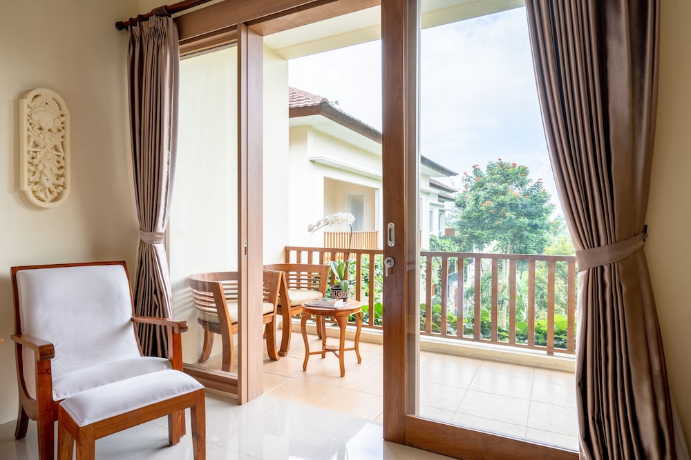 Deluxe Room, Balcony, Pool View - Photo 9