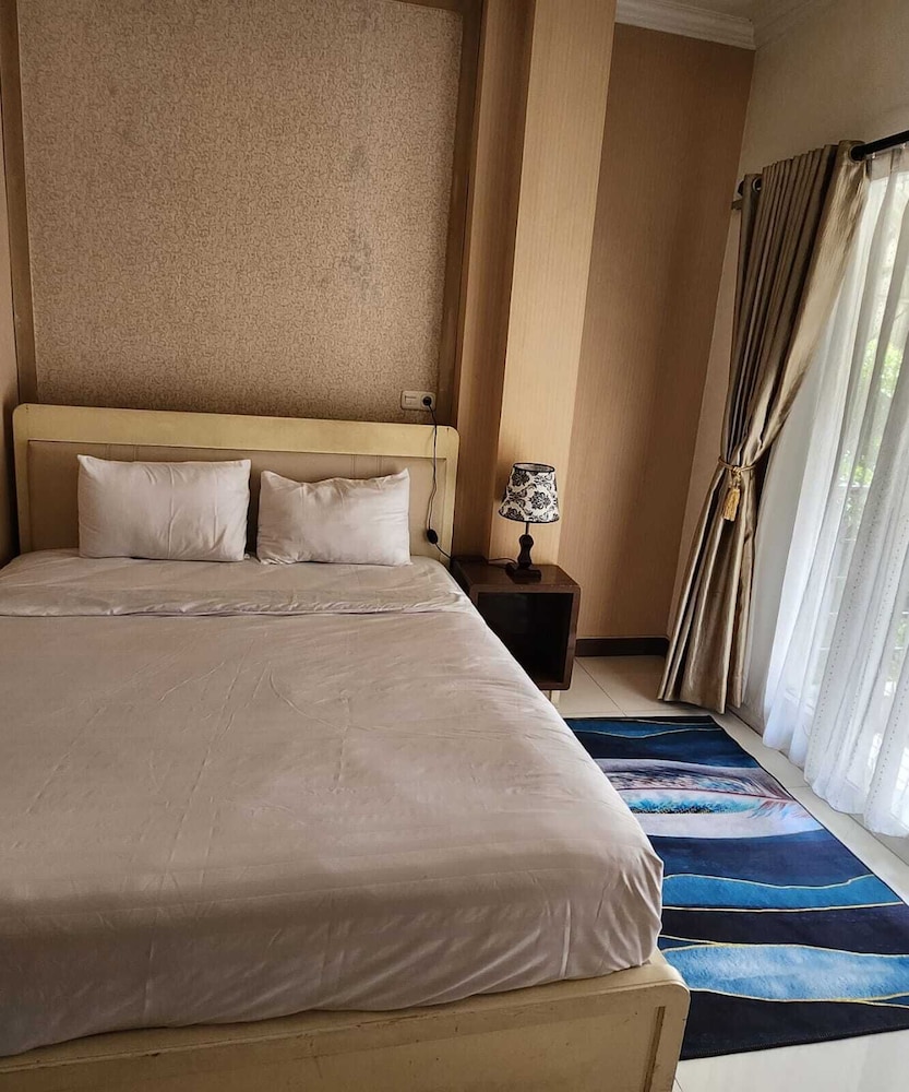 Deluxe Room - Photo 1