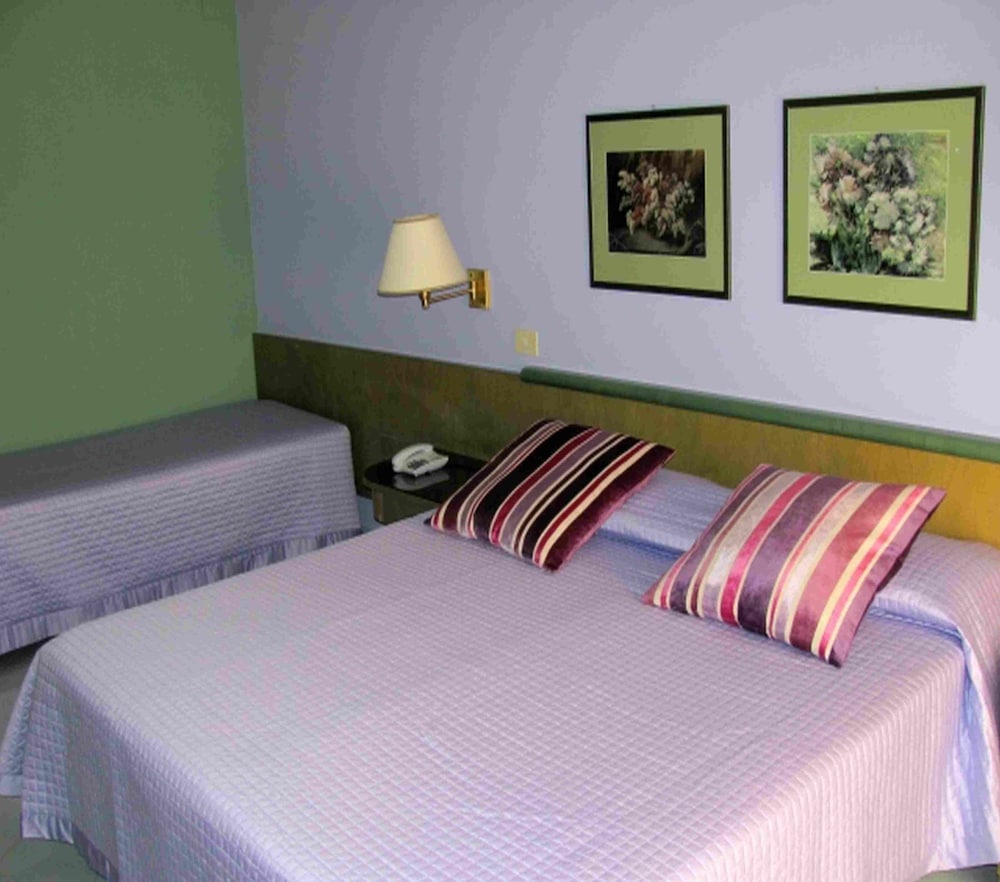 Standard Triple Room, Balcony, Garden View