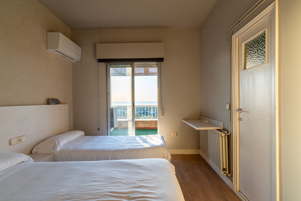 Habitación Estándar con Dos Camas Individuales