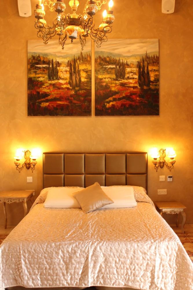 Deluxe Quadruple Room, Multiple Beds, Balcony, City View