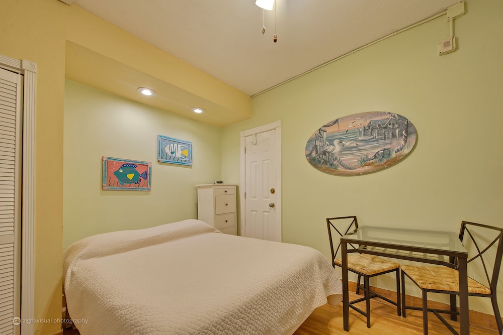 #1 = Sand and Sun = efficiency with a queen sized Bed