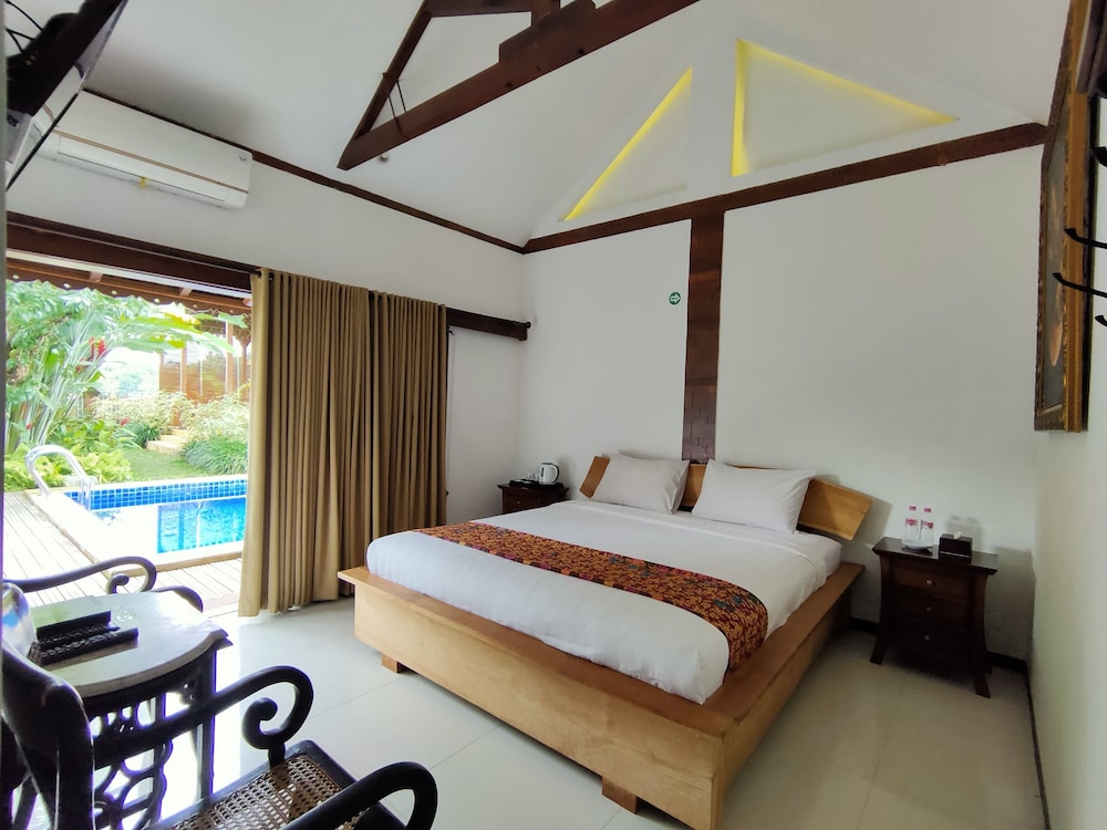 Deluxe Cottage, 1 Queen Bed, Pool View, Poolside photo 1