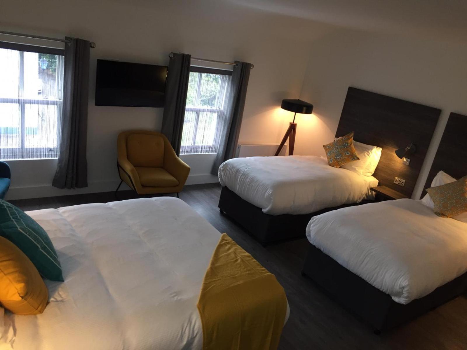 Deluxe Quadruple Room - Photo 7