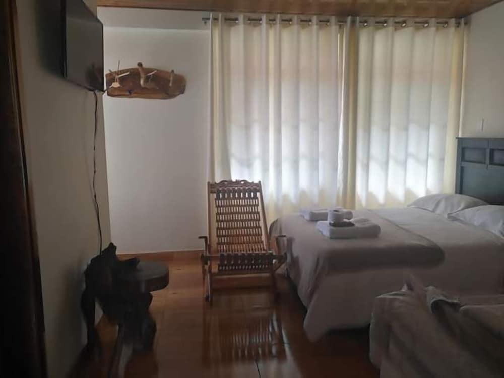 Comfort Triple Room, 2 Queen Beds, Mountain View photo 1