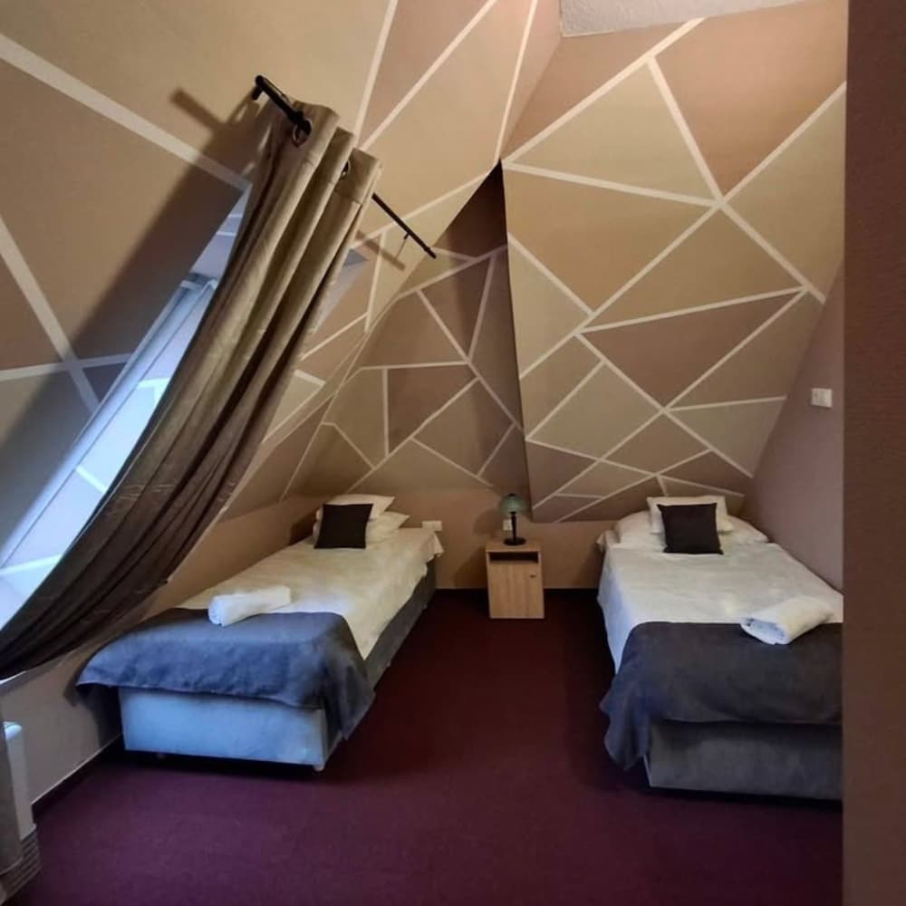 Standard Quadruple Room, Multiple Beds photo 1