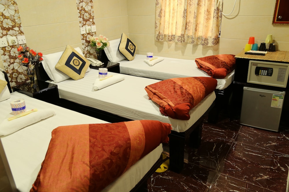 Deluxe Triple Room (1 Double and 1 Single) photo 1