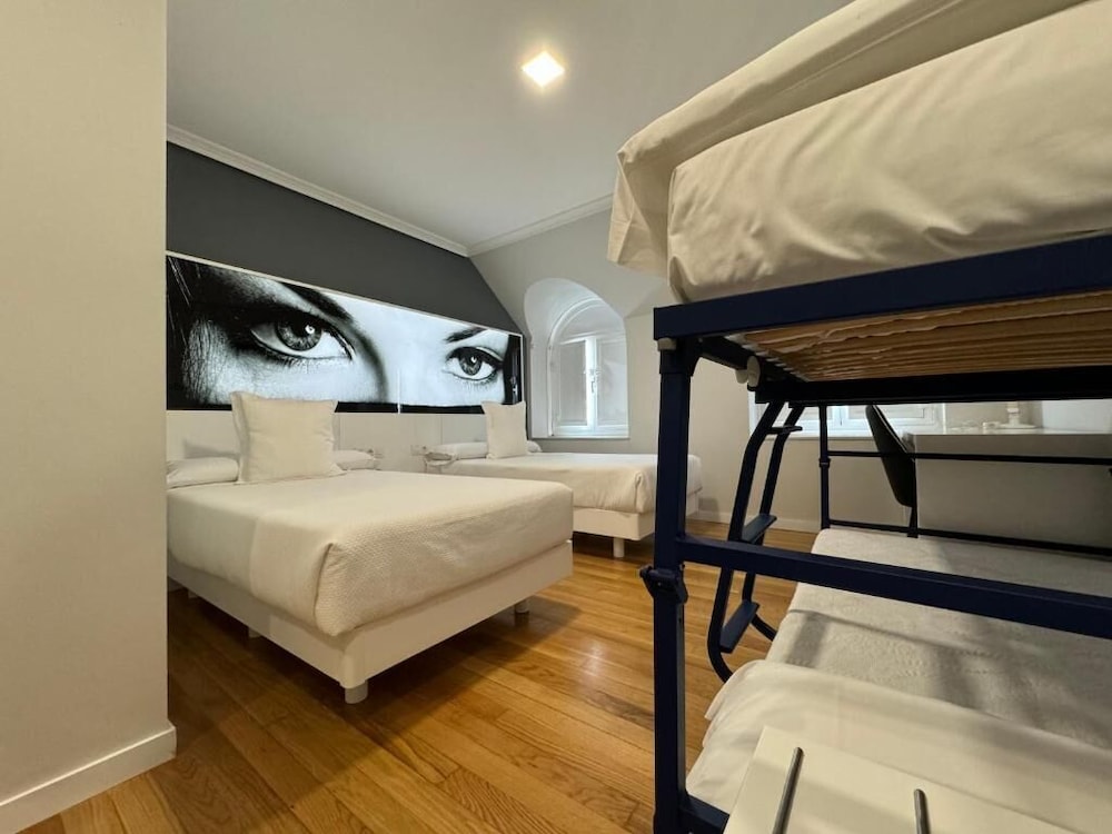 Habitación Triple Comfort, Vista a la Ciudad