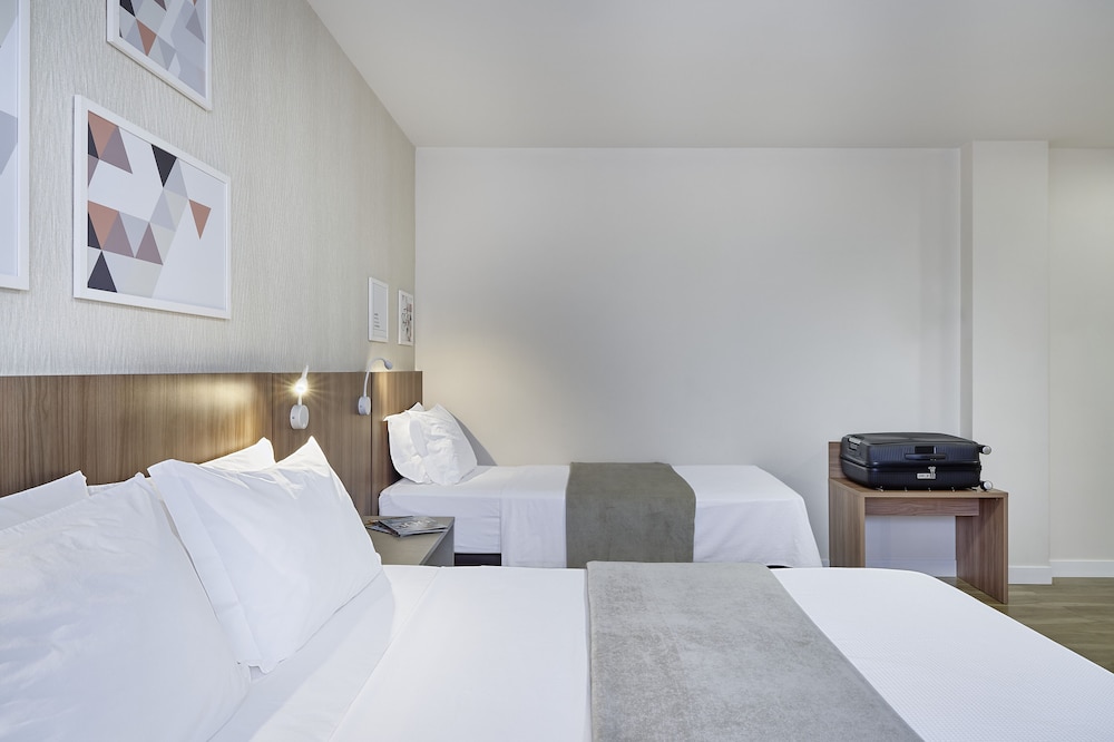 Deluxe Triple Room - Photo 1