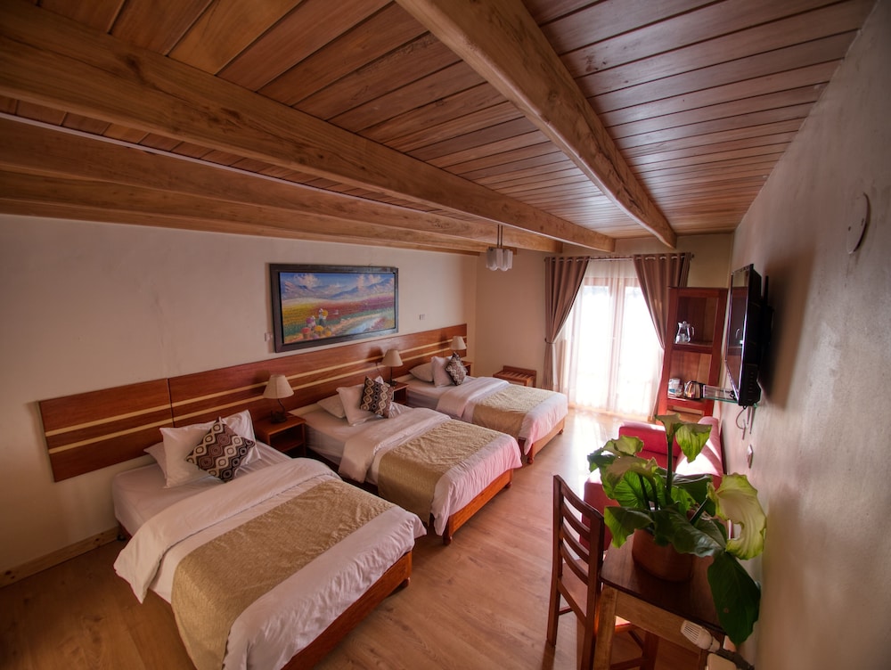 Deluxe Triple Room with Balcony and Views photo 3