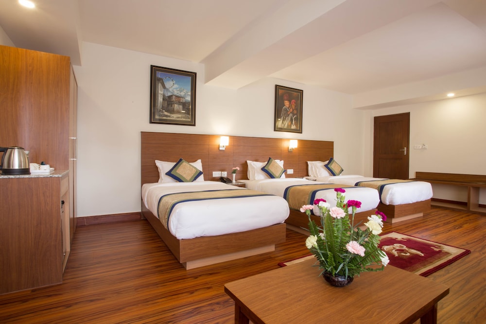 Deluxe Triple Room, 3 Twin Beds, Private Bathroom, Garden View photo 3