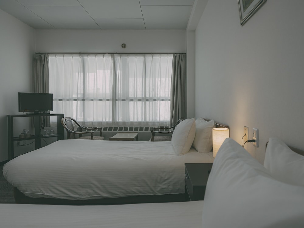 Western Room with 2 single beds - Bath and Toilet, Non Smoking photo 2