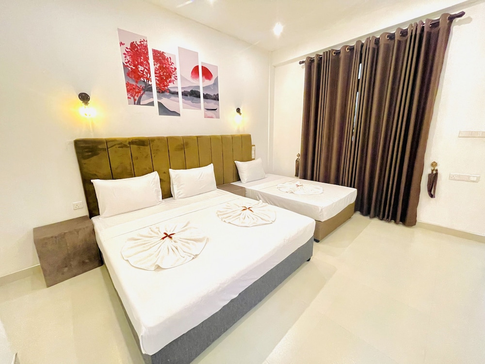 Deluxe Triple Room