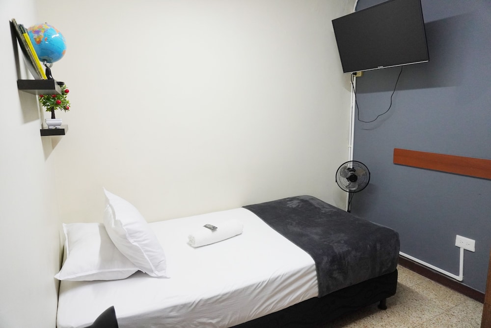 Standard Single Room, 1 Large Twin Bed, Shared Bathroom (Gray Room)