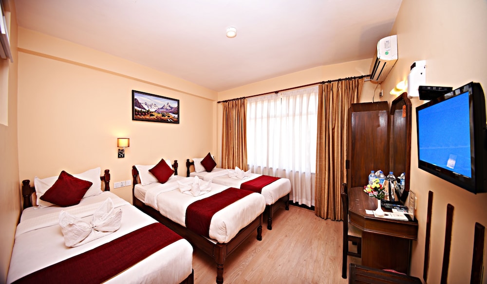 Deluxe Triple Room - Photo 1