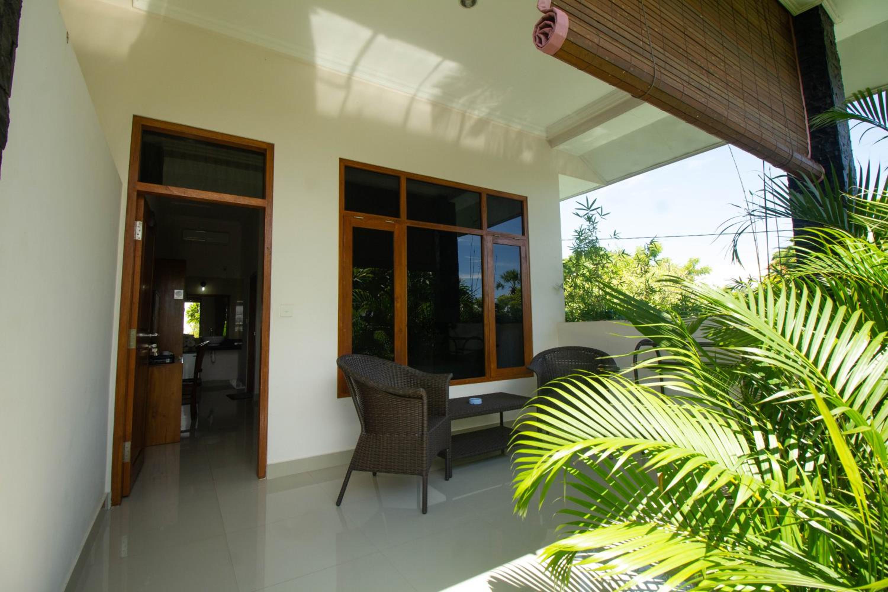 Deluxe Twin Room with Balcony and Garden View - Photo 9