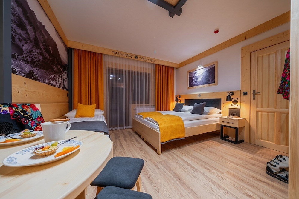 Deluxe Quadruple Room, Balcony photo 1