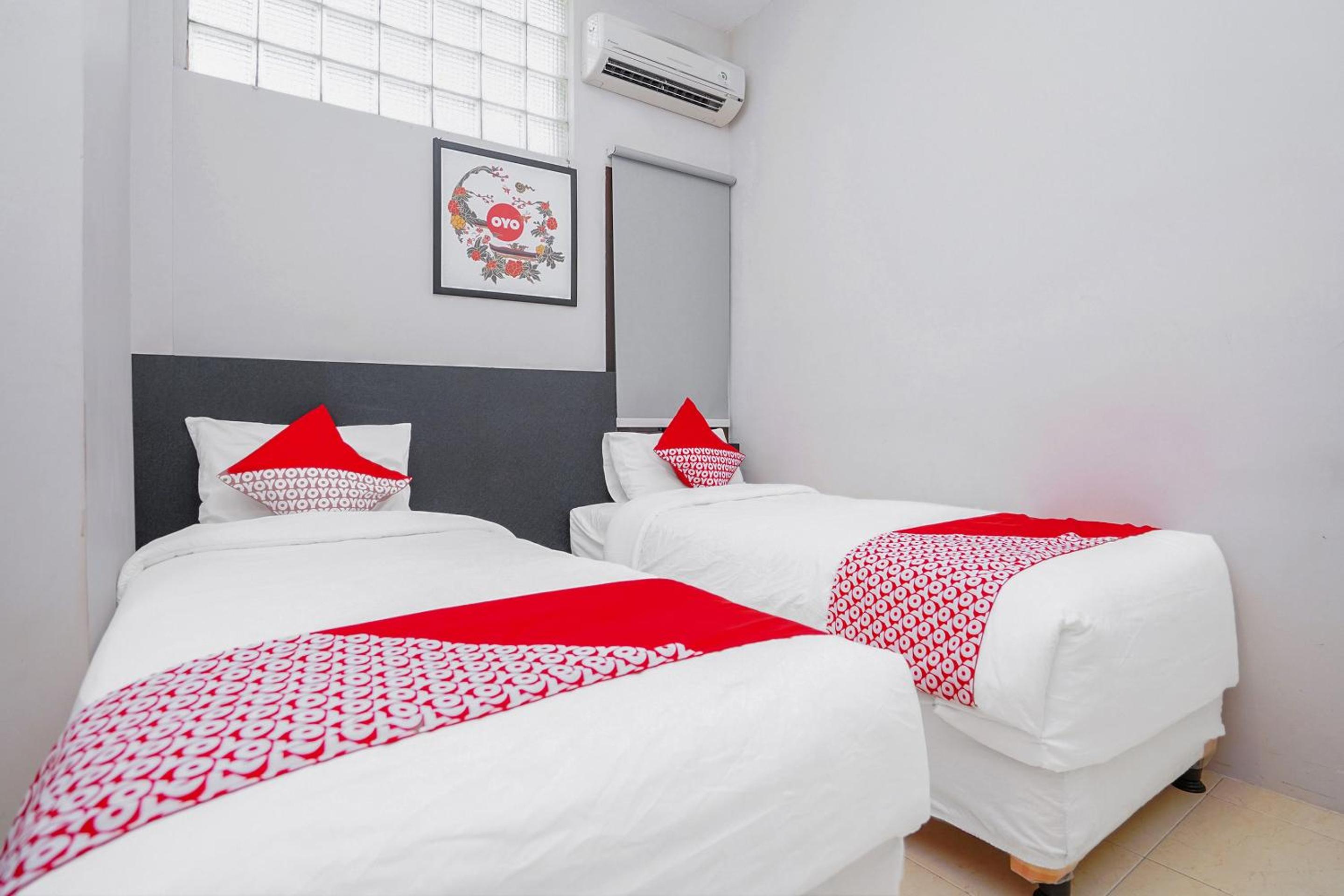 Delxue Twin Room - Photo 10
