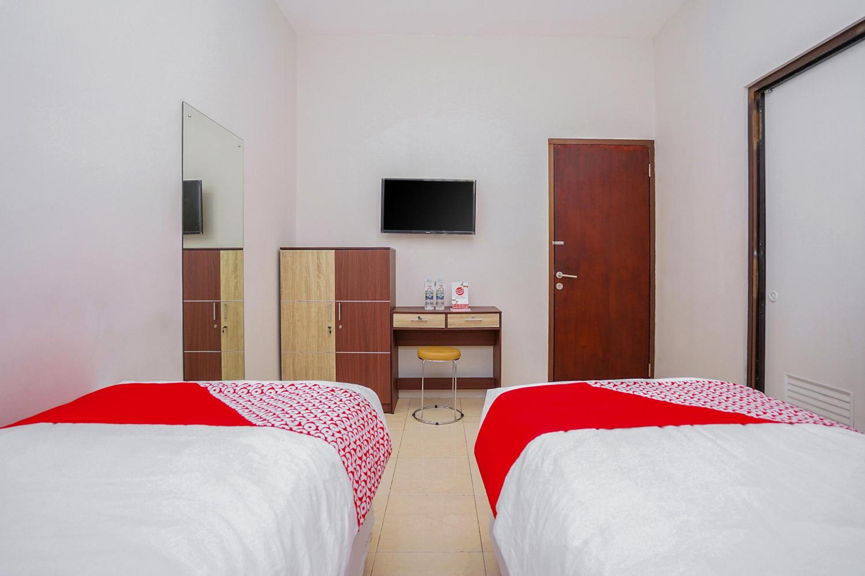 Delxue Twin Room - Photo 7
