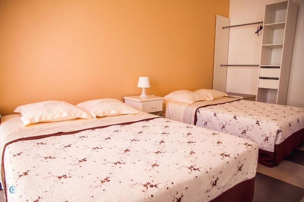Basic Quadruple Room, 2 Double Beds, Smoking photo 1