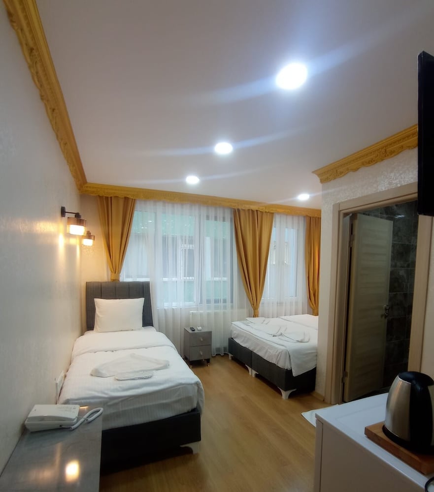 Grand Triple Room photo 1