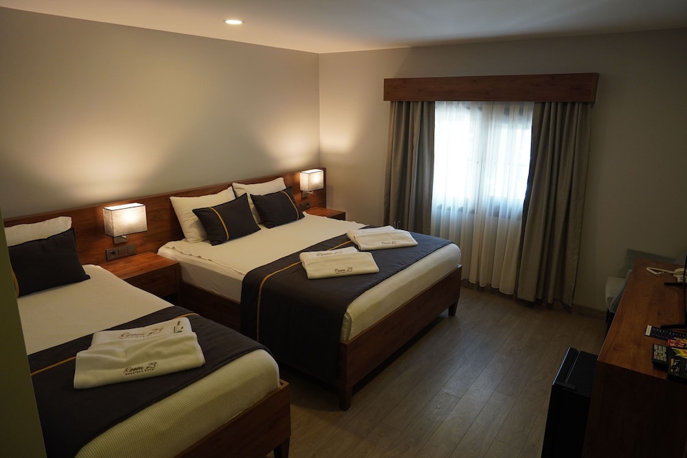 Standard Triple Room, Garden View - Photo 1